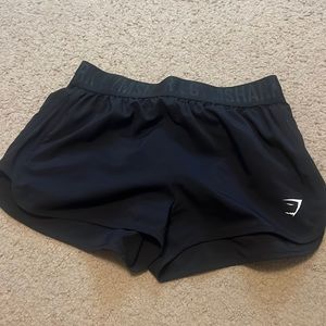 Gymshark athletic shorts. Color black. Size medium worn once new condition.